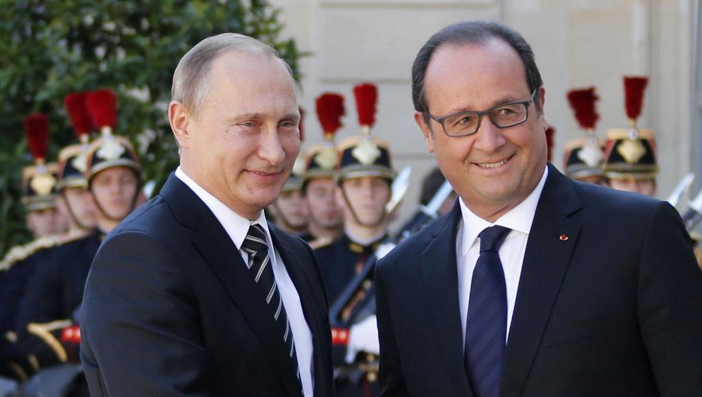 Олланд пригласил Путина на климатический саммит в Париж
